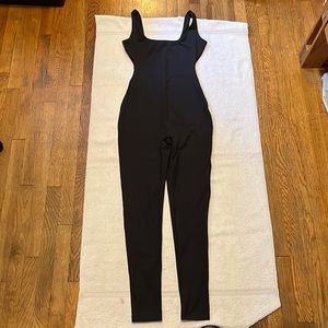 SKIMS ALL-IN-ONE ONESIE IN onyx